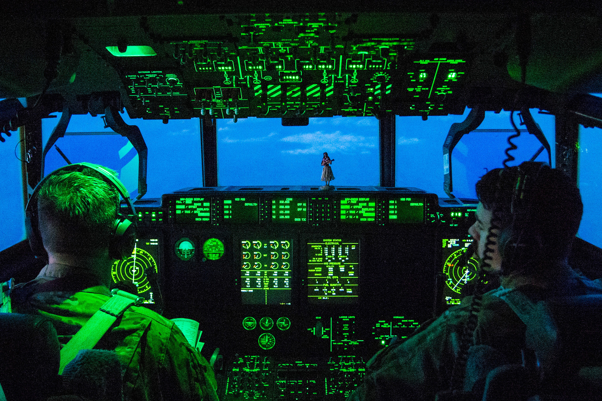 C-130 pilots prepare to land at Bagram Airfield following Marine Corps Gen. Joe Dunford, chairman of the Joint Chiefs of Staff, visit with trainers assigned to the Train Advise Assist Comand - Air, at Kandahar Airfield March 22, 2018. The mission of TAAC-Air is to train, advise, and assist Afghan partners to develop a professional, capable, and sustainable air force. TAAC-Air leverages train, advise and assist activities in concert with strong personal relationships, to create professional Afghan Airmen capable of planning, leading, employing, and sustaining decisive airpower operations. (DoD Photo by Navy Petty Officer 1st Class Dominique A. Pineiro.)