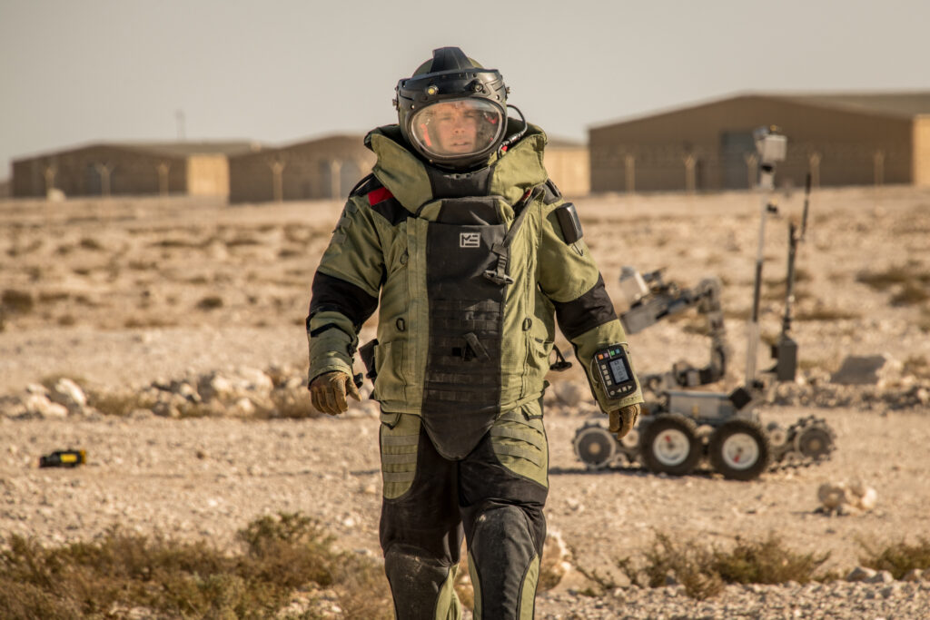 The 379th Expeditionary Civil Engineer Squadron noncommissioned officer in charge of explosive ordnance disposal training places an XRS-150 X-ray in front of a simulated downed unmanned aerial system during an exercise at Al Udeid Air Base, Qatar, Jan. 20, 2021. The 379th Expeditionary Security Forces Squadron and 379th ECES defended against an UAS that posed a potential threat to the safety and security of Al Udeid AB. (Air National Guard photo by Tech. Sgt. Brigette Waltermire.)
