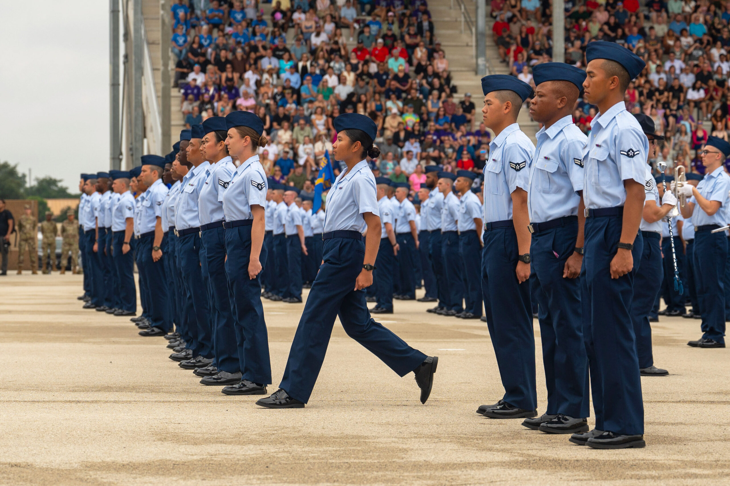 Graduation from U.S. Air Force Basic Military Training. More than 700 Airmen assigned to Flights 553-568, receive their Airman’s coin during the 737th Training Group’s Coin and Retreat Ceremony, at Joint Base San Antonio-Lackland, Texas, September 4, 2024. The ceremony is one of three USAF BMT graduation events and signifies the transition from trainee to Airman. The 37th Training Wing, known as “Gateway to the Air Force” is home to BMT.