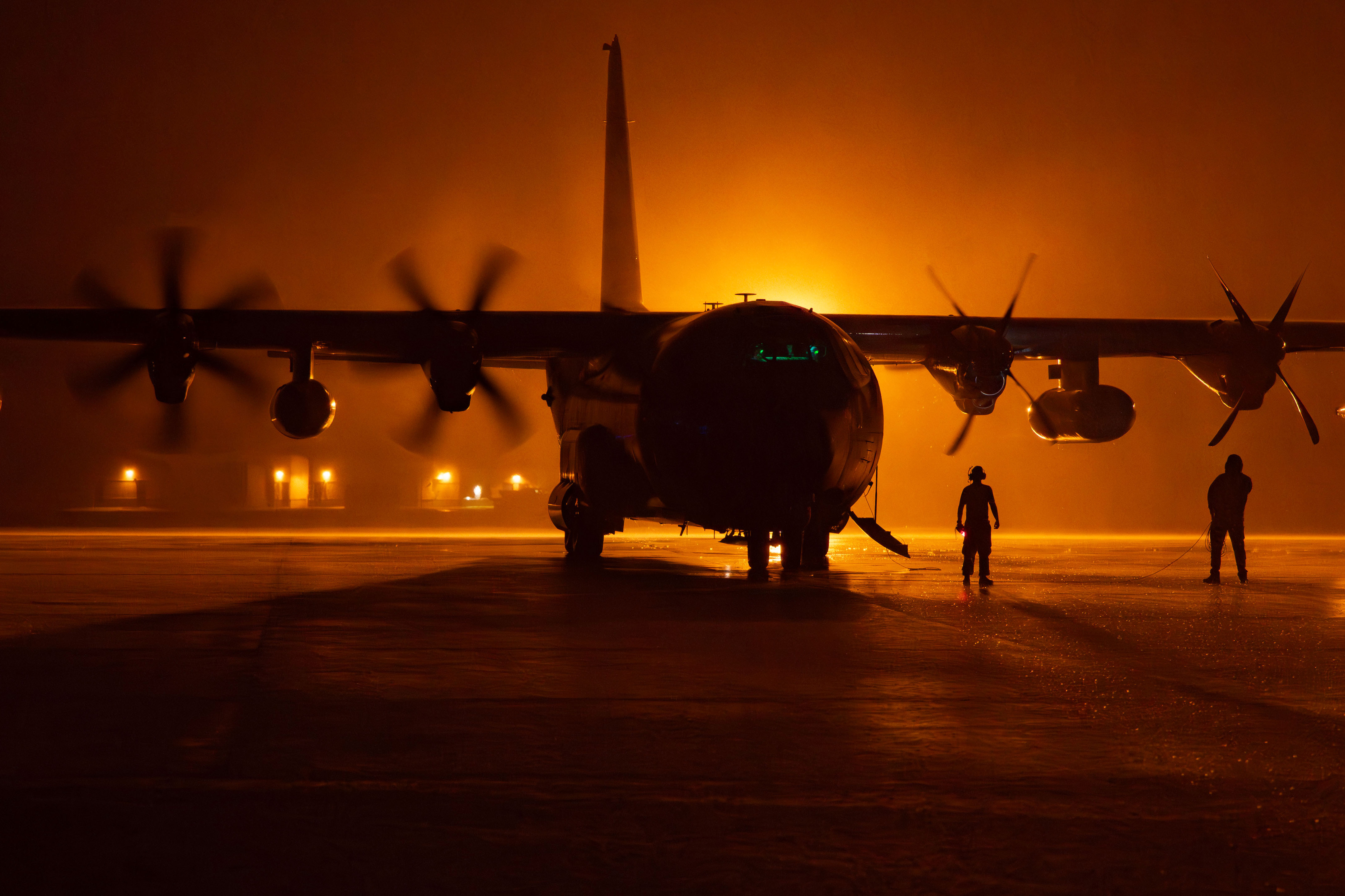 Airmen, assigned to the 920th Rescue Wing, make final checks for the HC-130J Combat King II aircraft in anticipation of Hurricane Milton at Patrick Space Force Base, Florida, Oct. 7, 2024. In under 24 hours, the aircraft were prepped, inspected, and flown to an alternate location, demonstrating the wing’s ready now mindset for rapid-deployment rescue operations. (U.S. Air Force photo by Tech. Sgt. Darius Sostre-Miroir.)