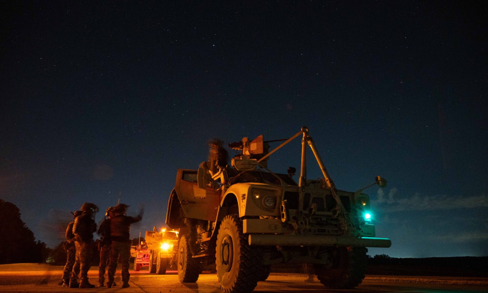 U.S. Soldiers assigned to the 2nd Battalion, 5th Special Forces Group (Airborne), conclude a mounted live-fire exercise with air support from an AC-130 gunship assigned to the 1st Special Operations Wing, at Saint Vith Range during exercise Sage Eagle 25-1 at Fort Knox, Kentucky, Oct. 22, 2024. Exercise Sage Eagle is a recurring, battalion-sized, unconventional warfare exercise that validates Special Forces’ ability to operate in uncertain environments while training and incorporating partner forces into an evolving contested environment.