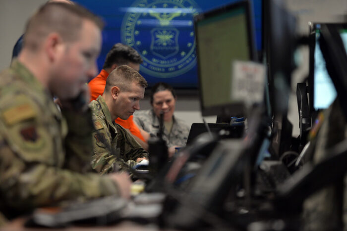 The 55th Force Support Squadron superintendent acts as the first-source of flood information for the 55th FSS from the Recovery Operations Center March 19, 2019, Offutt Air Force Base, Nebraska. The 55th Wing experienced record flooding as a result of unprecedented snowfall coupled with a dam in the northern part of the sate that failed. (U.S. Air Force photo by Josh Plueger.)