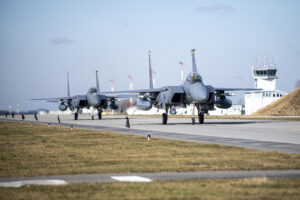 U.S. Air Force F-15E Strike Eagles from the 336th Fighter Squadron assigned to Seymour Johnson Air Force Base, North Carolina, taxi to their parking spots after completing a NATO Enhanced Air Policing mission out of Łask Air Base, Poland, Feb. 28, 2022. Air Defense integration and eAP demonstrates NATO’s capabilities, readiness and resolve to protect Allied populations. (U.S. Air Force photo by Tech. Sgt. Jacob Albers.)