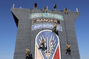 Air assault students rappel from a tower for practice and to build trust in their belay men during an air assault school held at the Joint Readiness Training Center and Fort Polk Jan. 9-20, 2023. (U.S. Army photo by Angie Thorne.)