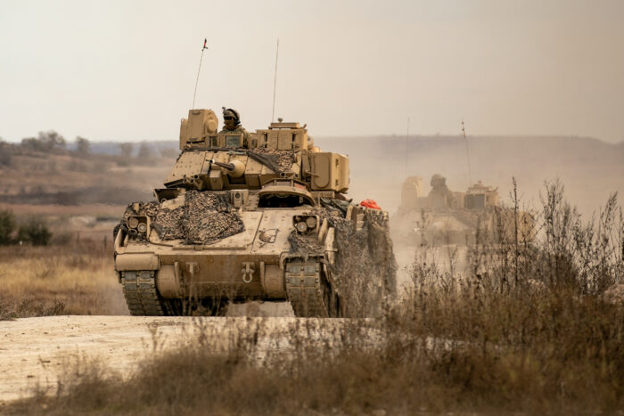 U.S. Army Soldiers assigned to 1st Battalion, 12th Cavalry Regiment, 3rd Armored Brigade Combat Team, 1st Cavalry Division, conduct a training exercise with M3A2 Cavalry Fighting Vehicles, during a combined arms live fire exercise at Jack Mountain range on Fort Cavazos, Texas, Jan. 14, 2025. The CALFEX incorporates indirect fires, aerial, and sustainment assets to simulate realistic combat training to validate a unit's lethality as well as their readiness to deploy. (U.S. Army photo by Spc. Josefina Garcia.)