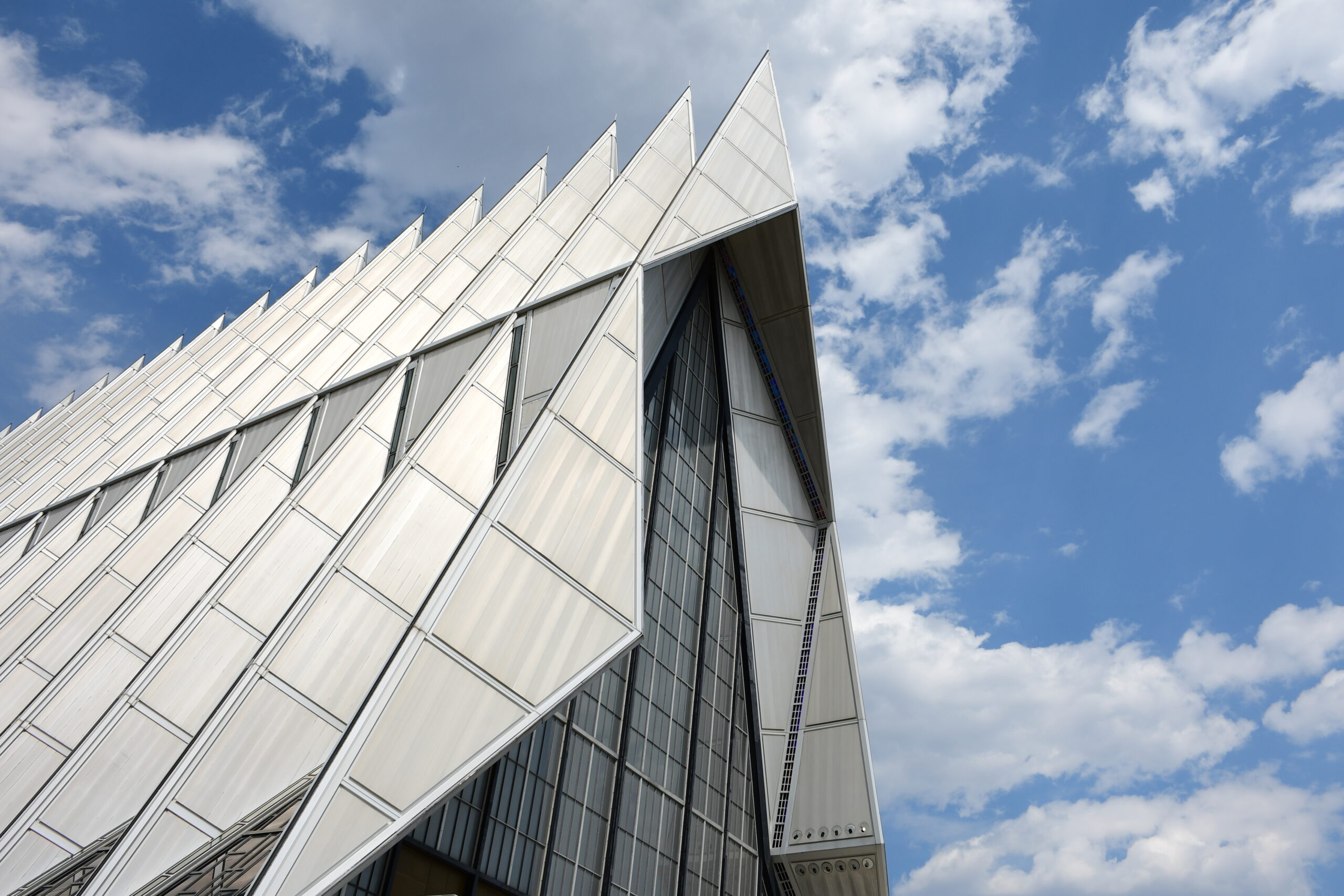 Clouds roll by the steeple of the Cadet Chapel at the U.S. Air Force Academy in Colorado Springs, Colorado on August 15, 2018. Commanders and command chiefs from around the 22nd Air Force joined their civic leader counterparts for a Senior Leader Summit held throughout the week where they toured the academy and other Air Force bases. (U.S. Air Force photo by Staff Sgt. Andrew Park.)