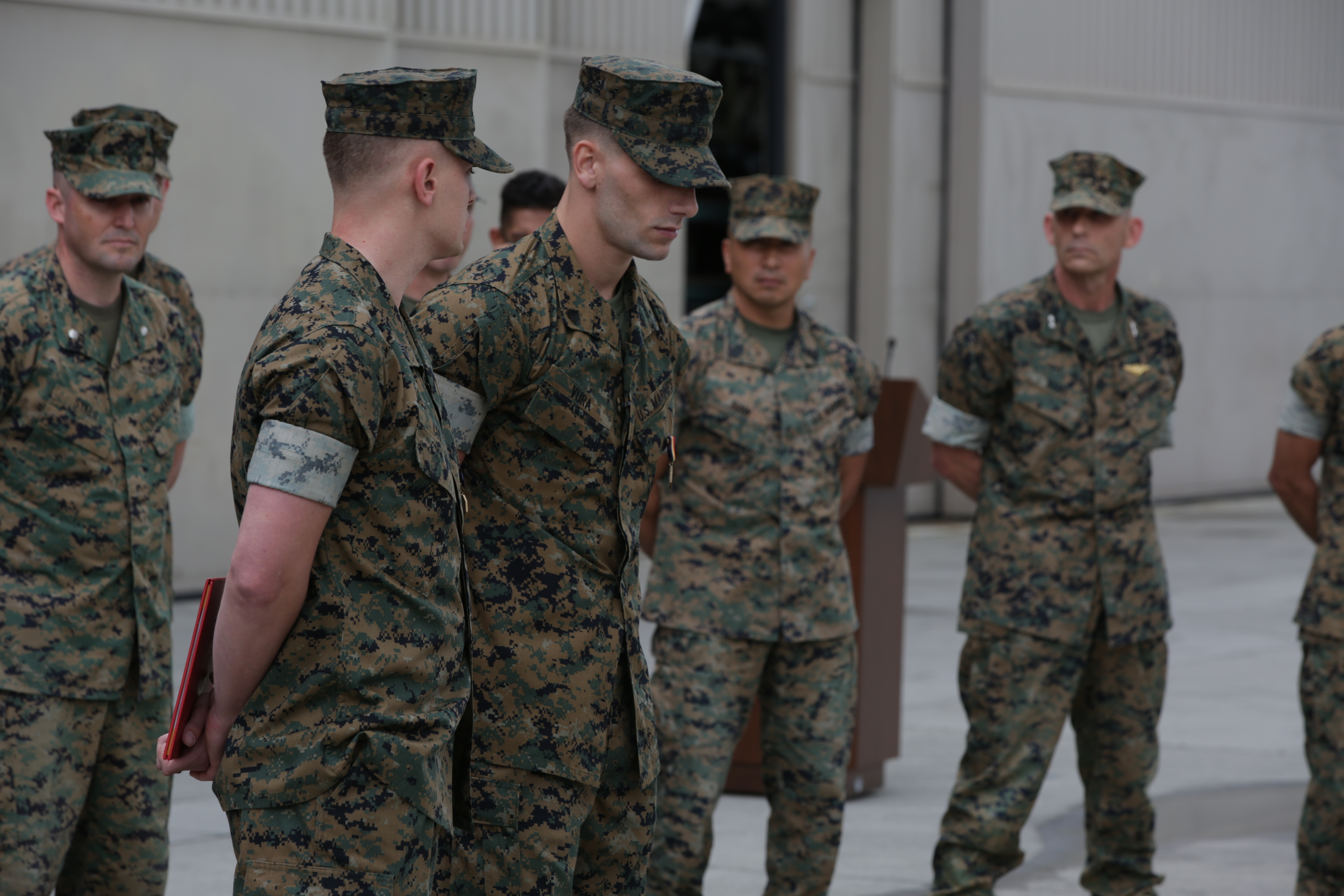 Navy and Marine Corps Medal recipients address Marine Light Attack Helicopter Training Squadron (HMLAT) 303 following an awards ceremony at Marine Corps Air Station Camp Pendleton, April 29, 2019. Their quick thinking, exceptional bravery, and selfless actions saved lives and prevented serious bodily harm of innocent bystanders during the Route 91 Harvest Music Festival shooting in Las Vegas, Nev., Oct. 1, 2017. The Navy and Marine Corps Medal is the highest non-combat decoration awarded for heroism by the United States Department of the Navy. (U.S. Marine Corps photo by Lance Cpl. Julian Elliott-Drouin.)
