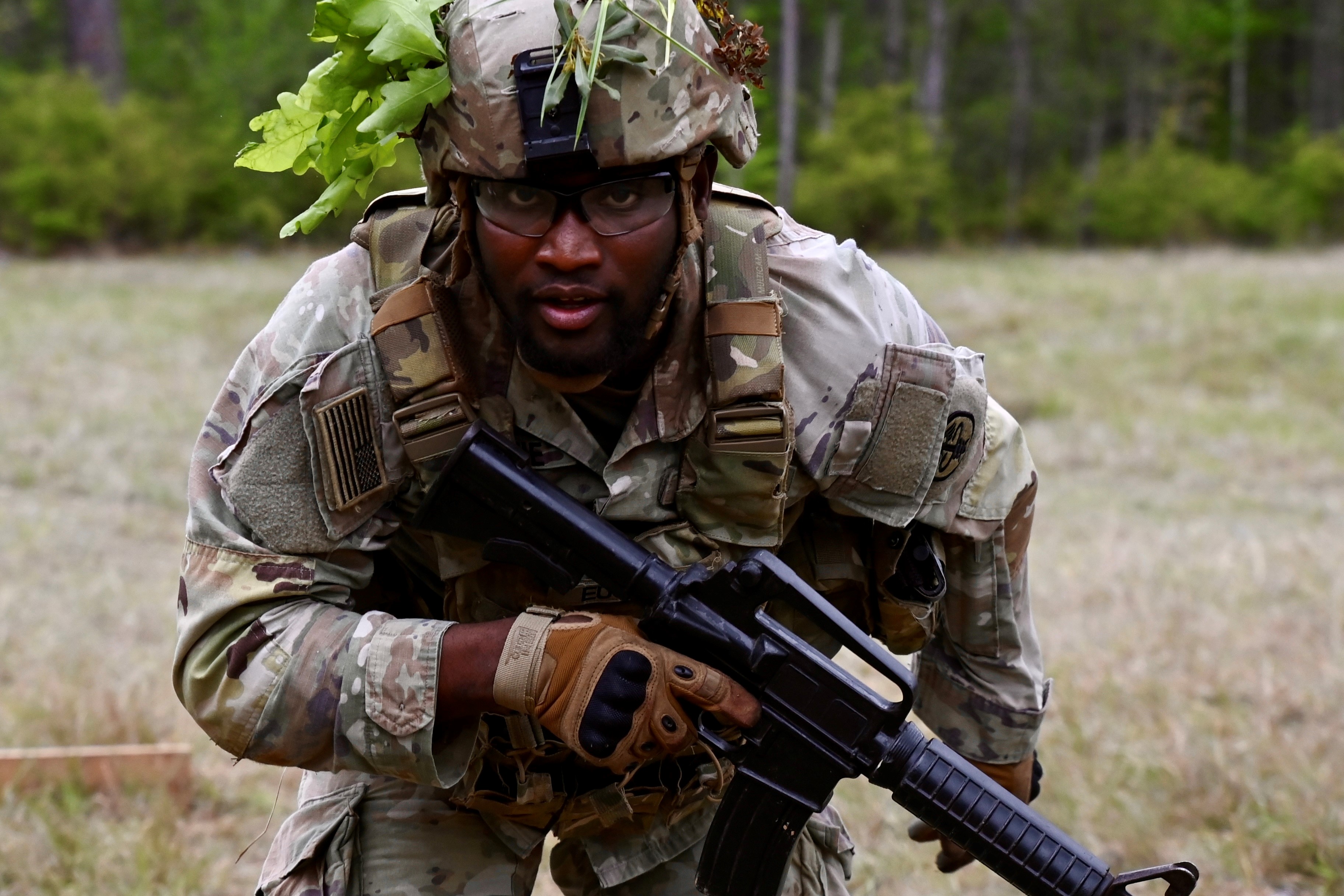 A combat medical specialist practices shoot, move and communicate techniques under simulated direct and indirect fire during the Bayne-Jones Army Community Hospital Forge, a field training exercise, April 1 at the Joint Readiness Training Center and Fort Johnson. (Courtesy photo by Bayne-Jones Army Community Hospital.)