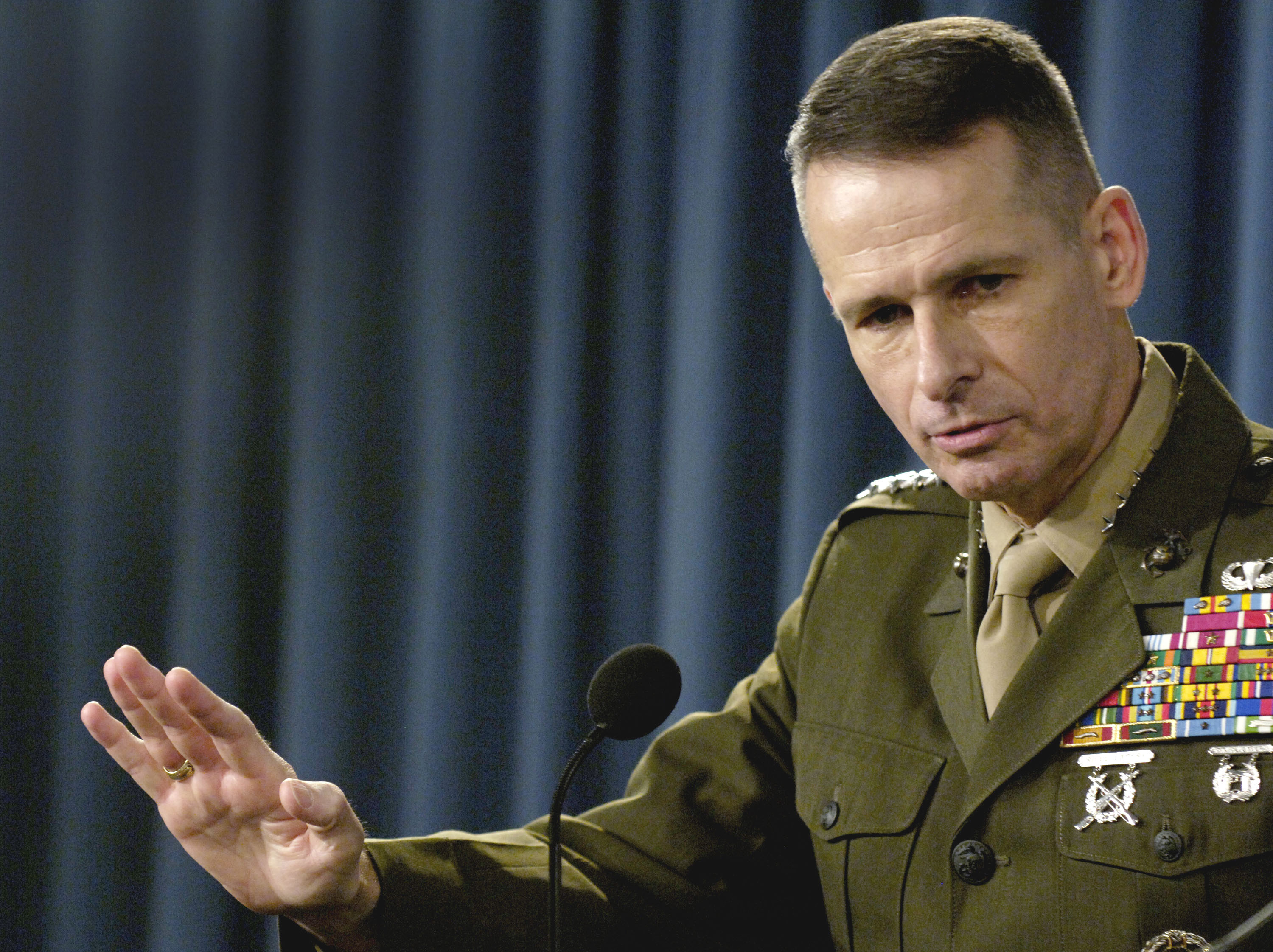 U.S. Marine Corps General answers a reporter's question during a Pentagon press briefing in Arlington, Va., on Feb. 21, 2006. (DoD photo by Petty Officer 1st Class Chad J. McNeeley, U.S. Navy.)