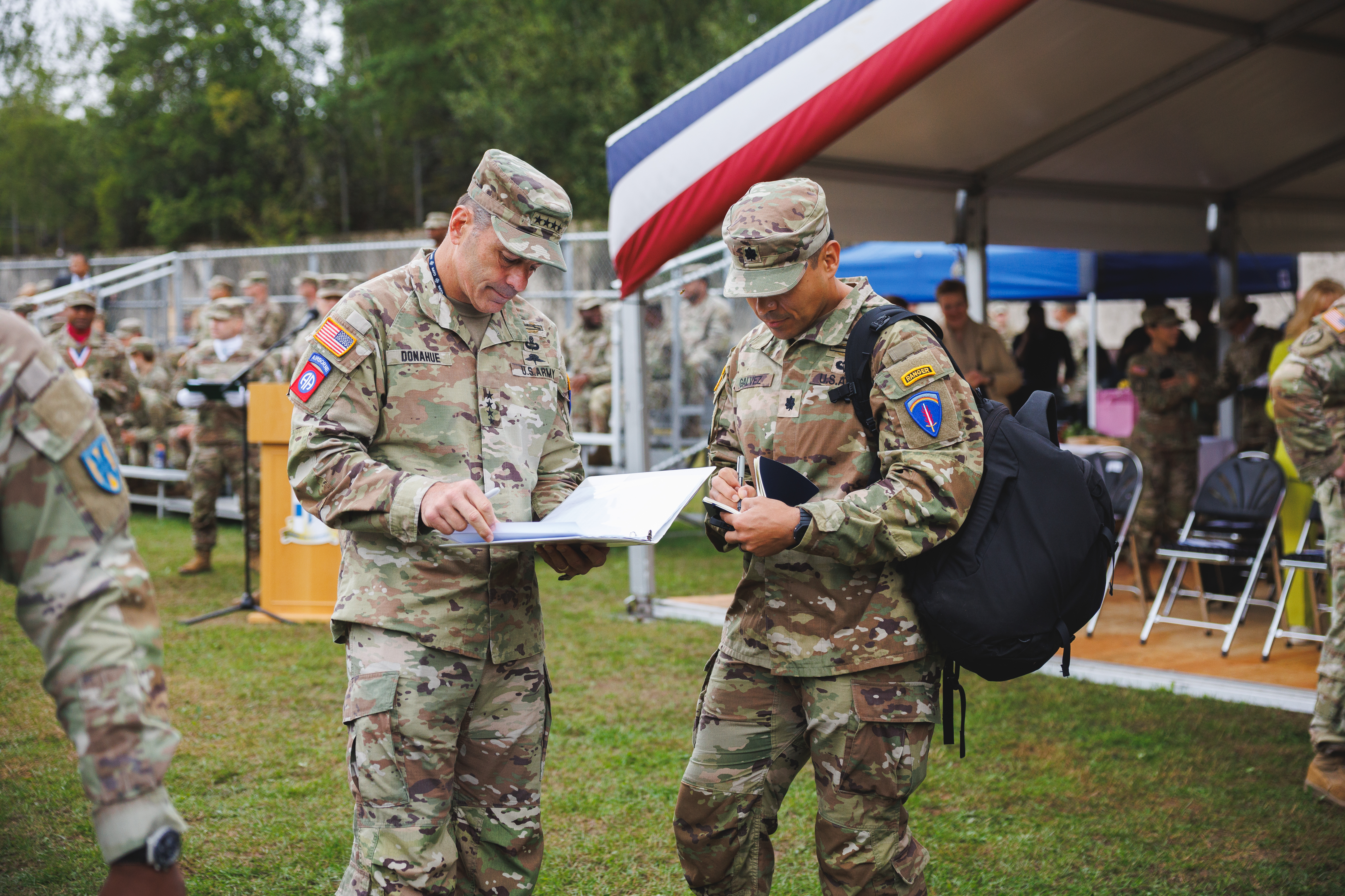 U.S. Army Gen. and Commander of U.S. Army Europe and Africa reviews talking points before the 21st TSC change of command ceremony hosted on Sembach Kaserne, Sembach, Germany, July 30, 2025. The 21st Theatre Sustainment Command is U.S. Army Europe and Africa's lead organization for all sustainment activities including logistics support, transportation, combat sustainment, human resources, finance, contracting and all other areas in the field of sustainment. (U.S. Army photo by Daryl Averill, Jr.)