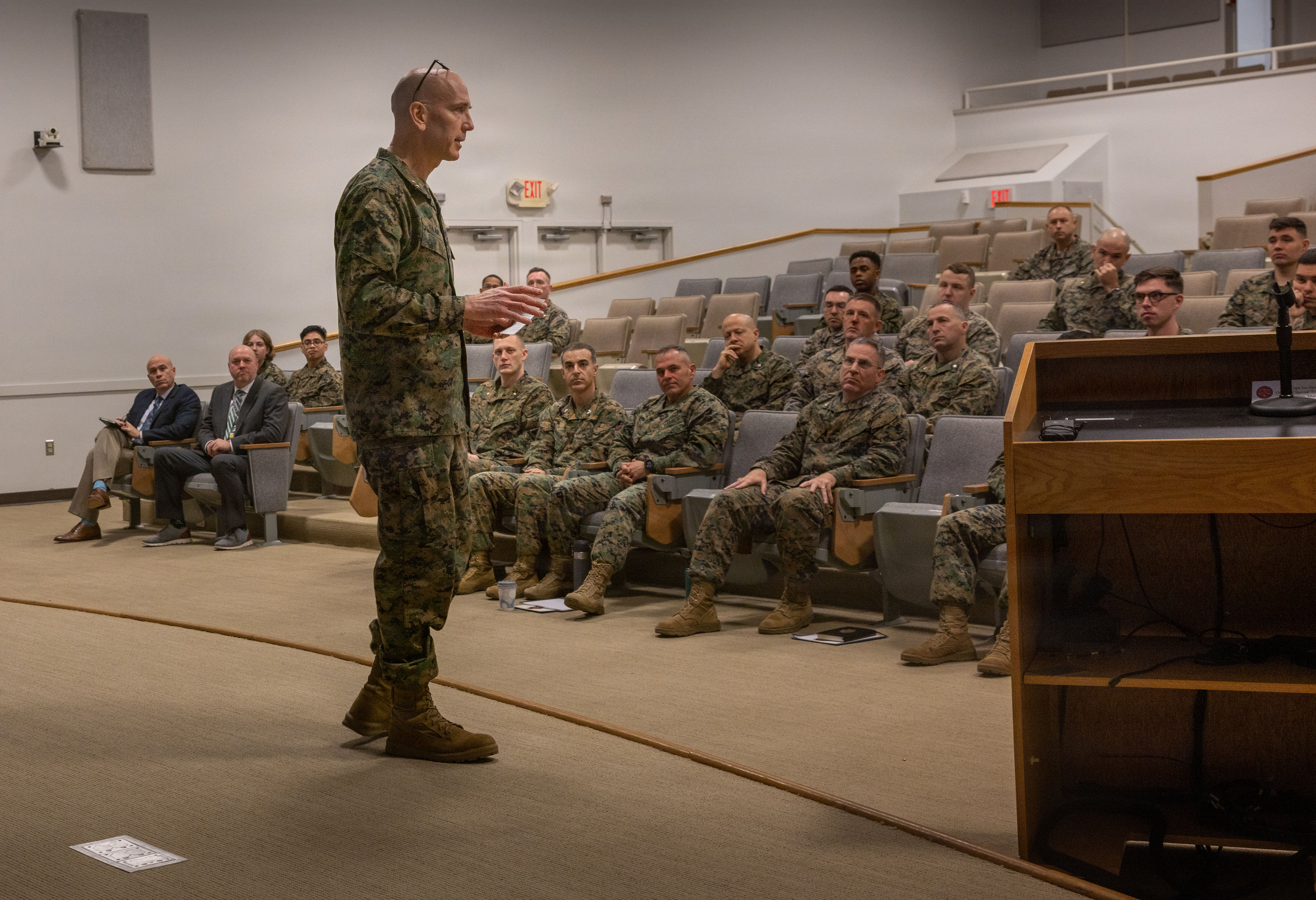 U.S. Marine Corps Maj. Gen. and staff judge advocate to the Commandant of the Marine Corps gives his remarks at the Sustained Operational Law Training 26.1 at the Littoral Warfare Training Center Auditorium on Marine Corps Base Camp Lejeune, North Carolina, Jan. 13, 2026. The SOLT 26.1 was held to provide an opportunity for Marines to gather as Judge advocates, leaders, and legal professionals to establish a baseline for legal performance across the Marine Corps. (U.S. Marine Corps photo by Lance Cpl. Isabelle Hutmacher.)