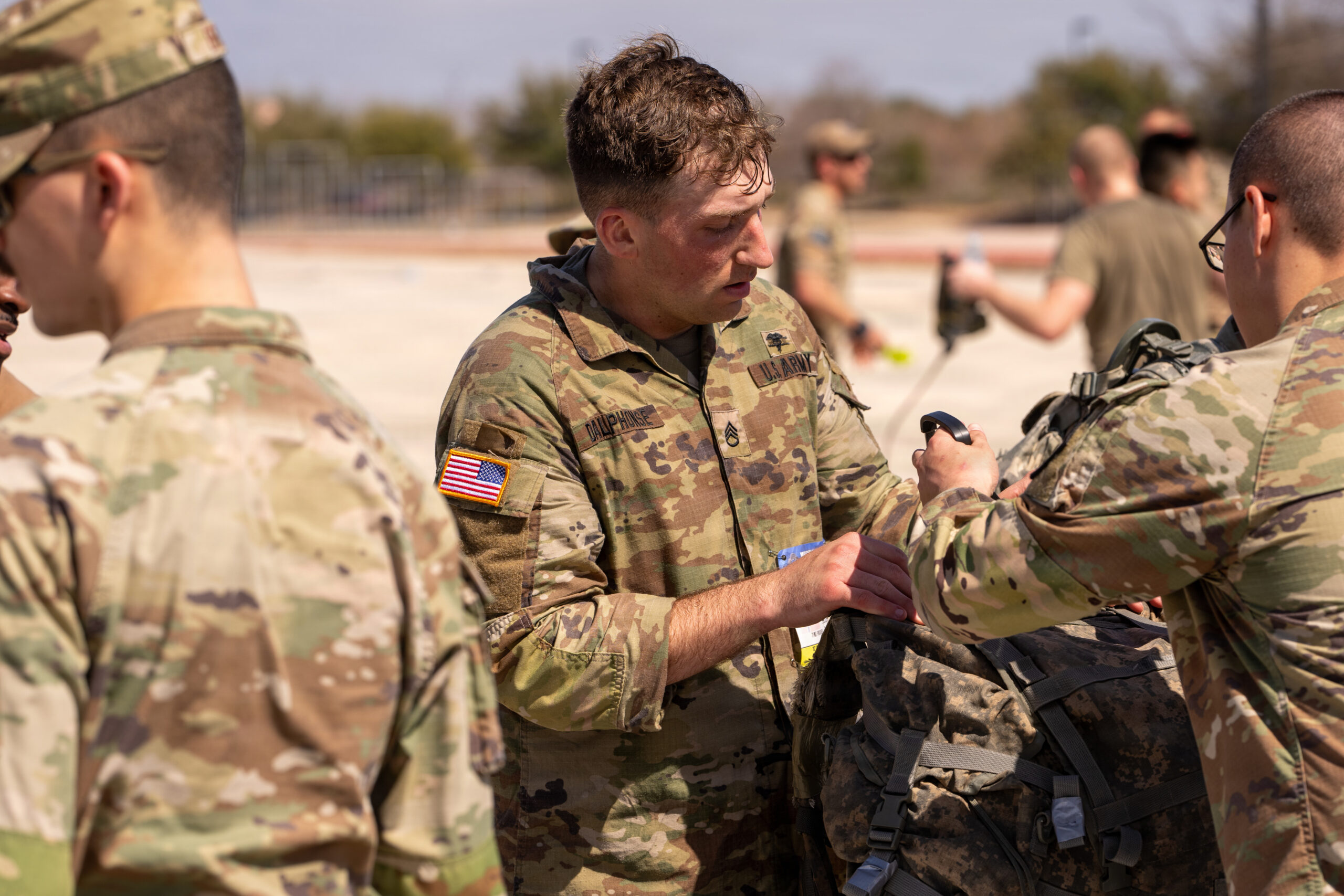 U.S. Army Staff Sgt. and Noncommissioned Officer Academy Advanced Leader Course small group leader has his rucksack weighed at the conclusion of the Norwegian Foot March at Joint Base San Antonio-Lackland, Texas, March 2, 2026. Participants were required to meet minimum weight standards for the 18.6-mile endurance event, which began with a 4:30 a.m. weigh-in and concluded with final qualifying times and an awards ceremony. (U.S. Air Force photo by Jonathan R. Mallard.)