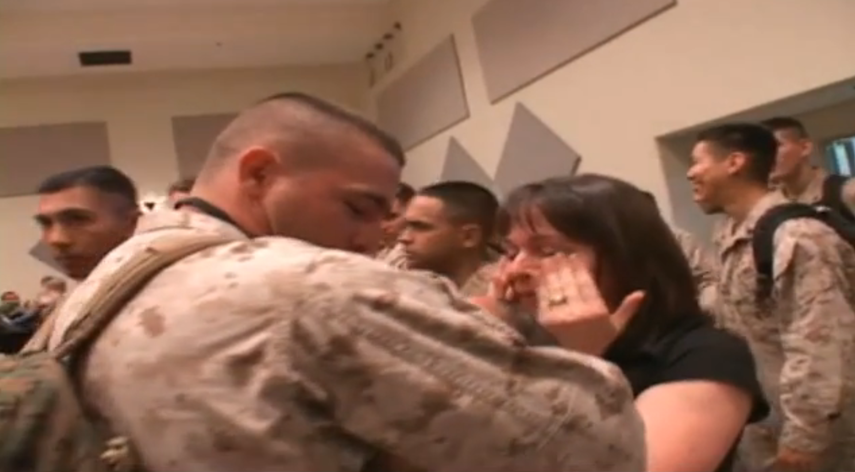 B-roll of Petty Officer 3rd Class reuniting with his family. Scenes include the petty officer's wife and newborn daughter waiting for his arrival, the petty officer greeting and hugging his wife and seeing and holding his daughter for the first time and the petty officer and his wife each speaking to a military reporter about how he and his family coped with their separation during the deployment. (U.S. Marine Corps Courtesy Video.)