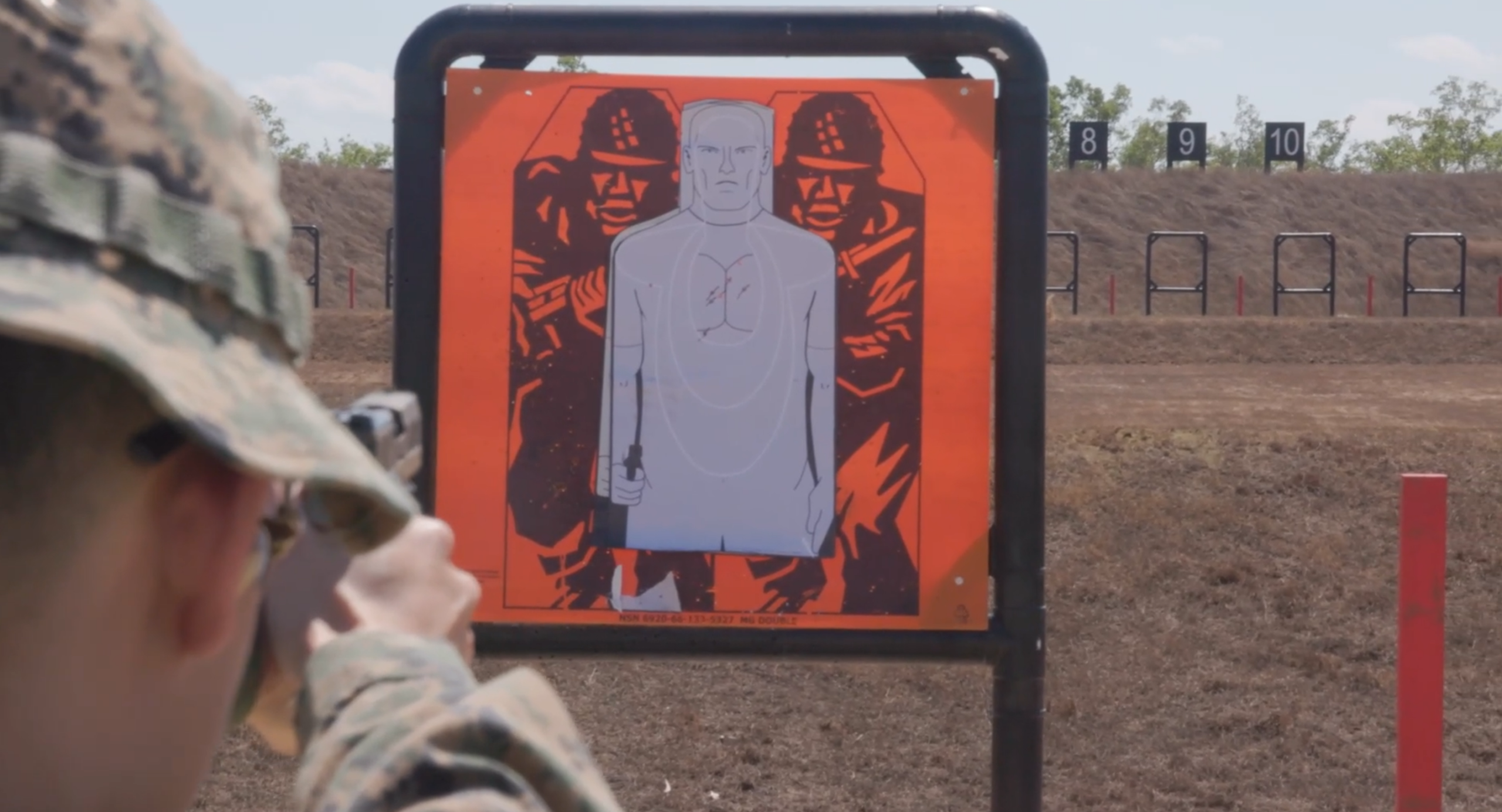 U.S. Marines with Marine Rotational Force – Darwin 24.3 participate in a Combat Marksmanship Program annual pistol qualification range at Robertson Barracks, NT, Australia, Aug. 16, 2024. Pistol qualification enables Marines to enhance their shooting skills and maintain proficiency with a sidearm. (U.S. Marine Corps video by Cpl. Juan Torres.)